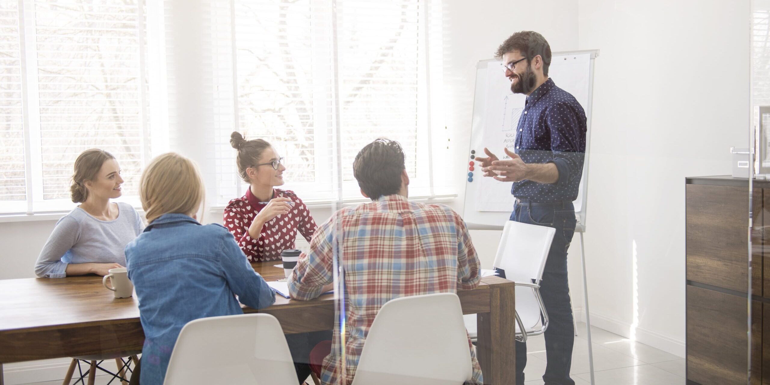 executive-presenting-strategy-of-work-min