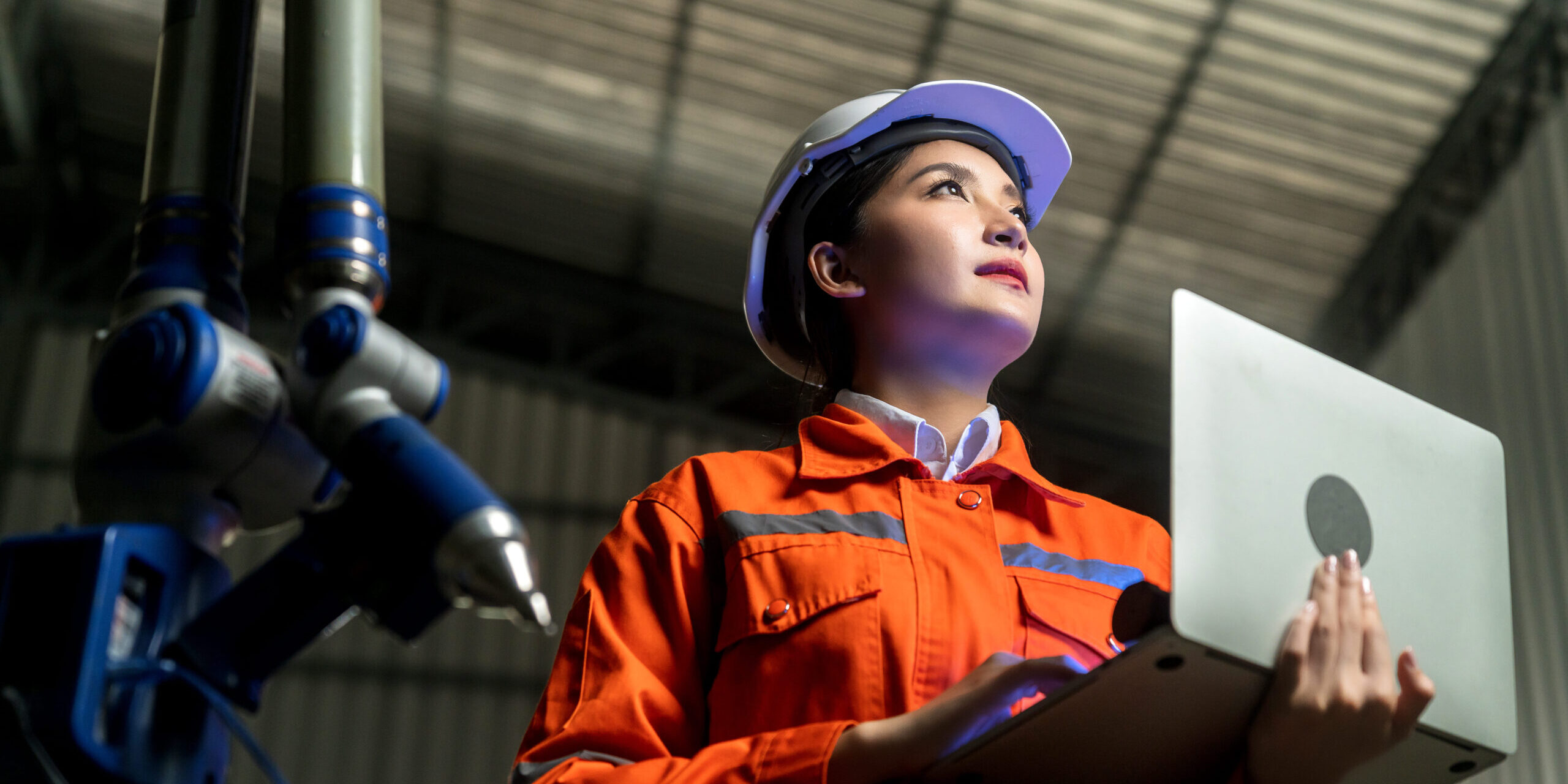 engineer-specialist-asian-female-technician-maintenance-inspect-relay-robot-arm-system-with-laptop-control-quality-operate-process-work-heavy-industry-40-manufacturing-smart-factory (1)